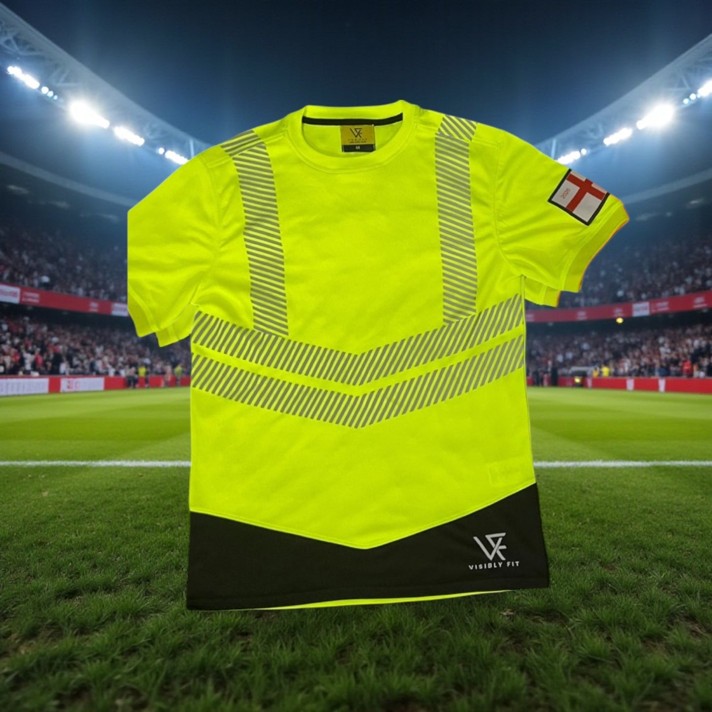 Yellow sports jersey with black accents on a grassy field at night